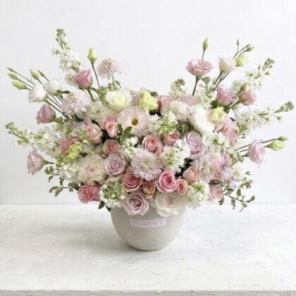 Sorbonne Sweetheart Ceramic Vase featuring a Pastel Floral Symphony of roses, lisianthus, and stock in a rounded pot.