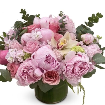Luxurious Passionate Peonies - Vase featuring soft pink peonies, roses, and delicate greenery in an elegant arrangement.
