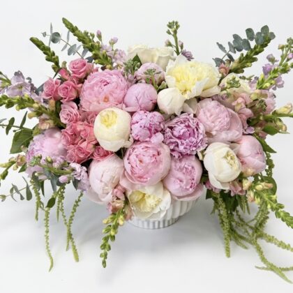 Luxurious Peonies Galore - Ceramic Vase featuring soft pink and white peonies, elegantly arranged with delicate greenery.