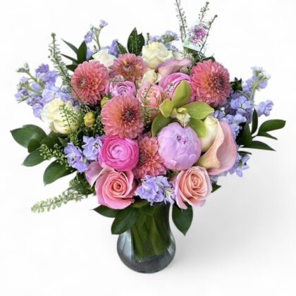Saint-Germain Ave. Vase - Botanical Artistry Redefined featuring a lush arrangement of pink dahlias, roses, and lavender stock.