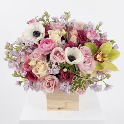 C'est La Vie Wood Pot - Pastel Floral Luxury featuring roses, anemones, and orchids in a wooden box.