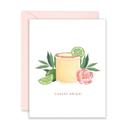 Cheers Amiga! Friendship Greeting Card featuring a cocktail with a lime slice, green leaves, and a soft pink peony flower.