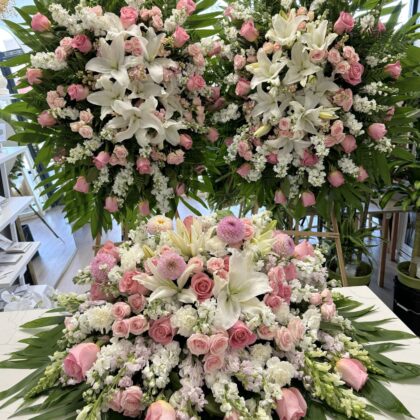 Eternal Sunshine – Complete Funeral Set featuring elegant pink roses, white lilies, and lush greenery in premium arrangements.